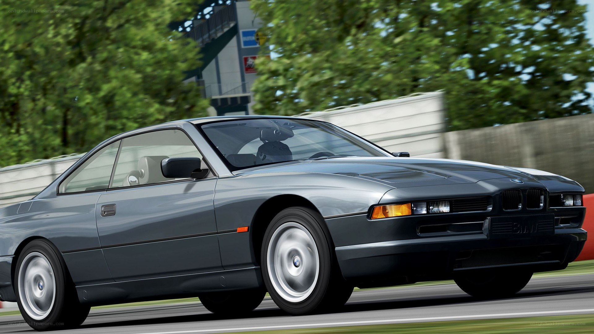 gray bmw coupe on a racetrack