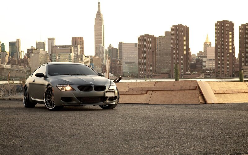 gray bmw in cityscape