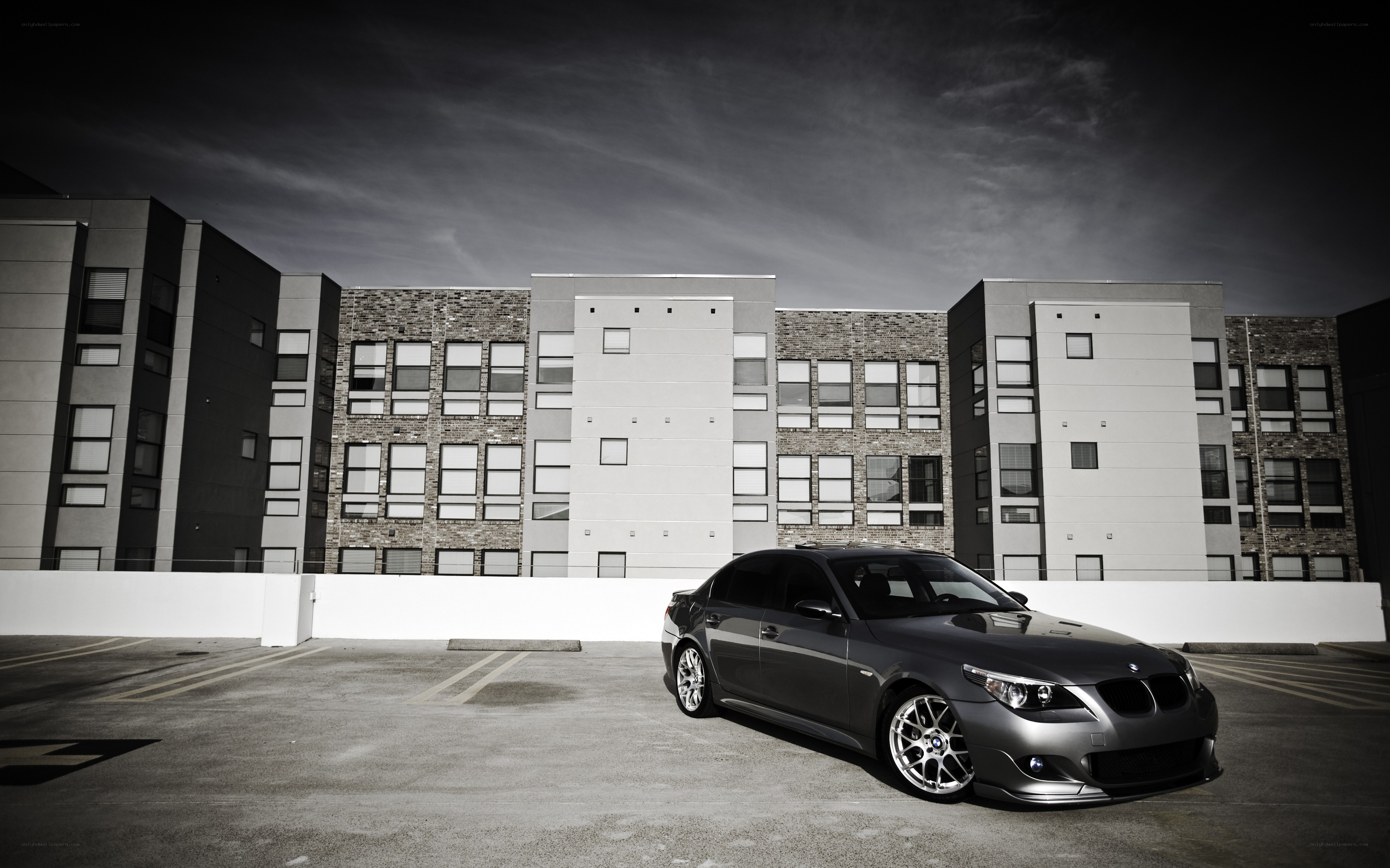 gray bmw in parking lot