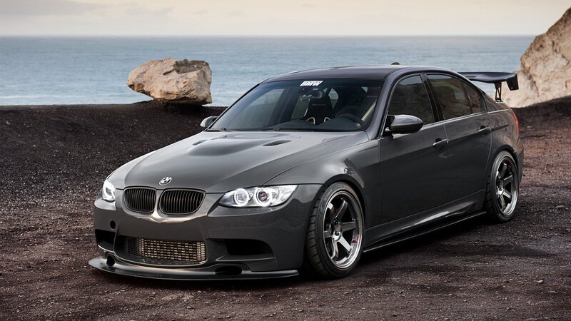 gray bmw m3 by the sea