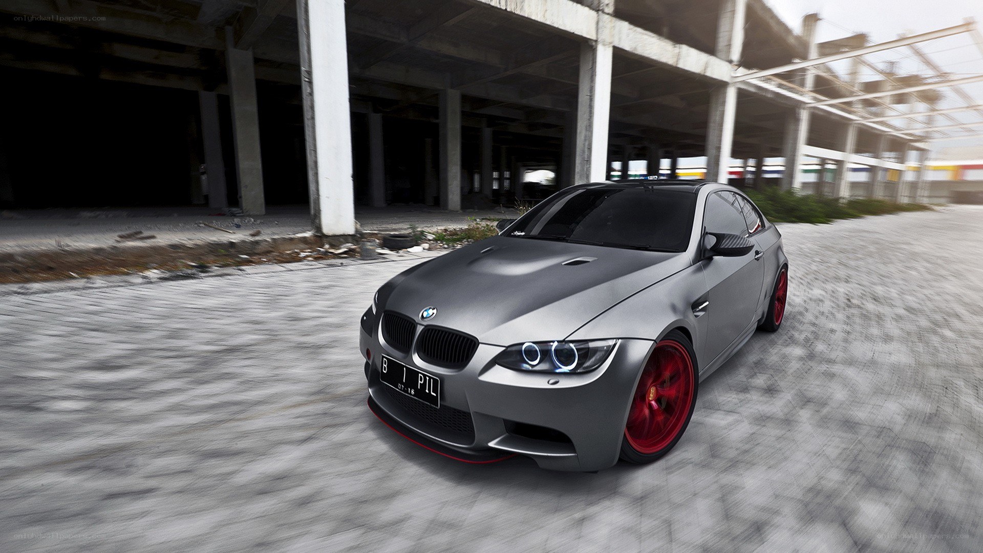 gray bmw m3 in abandoned building