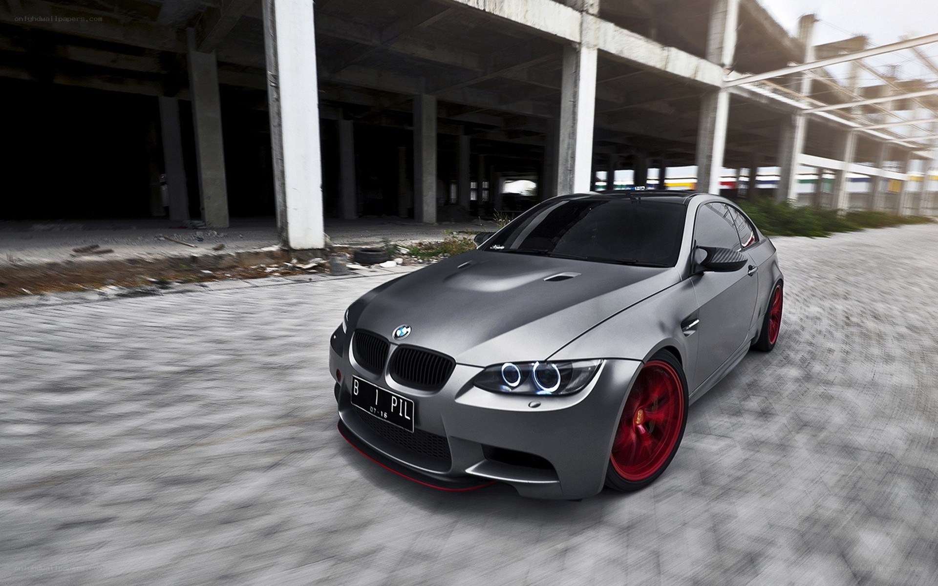 gray bmw m3 in abandoned building