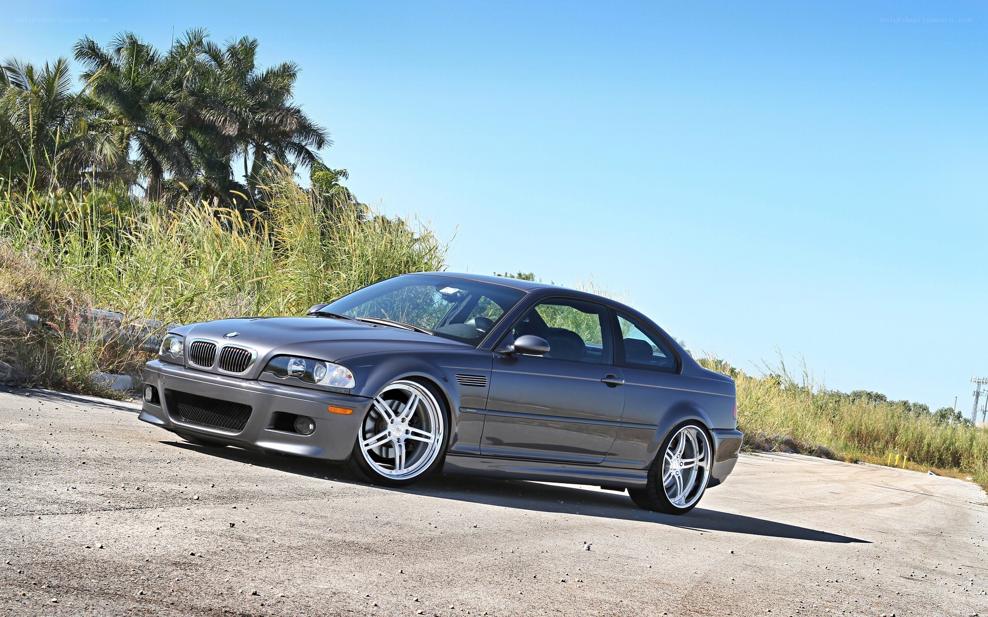 gray bmw m3 on a road