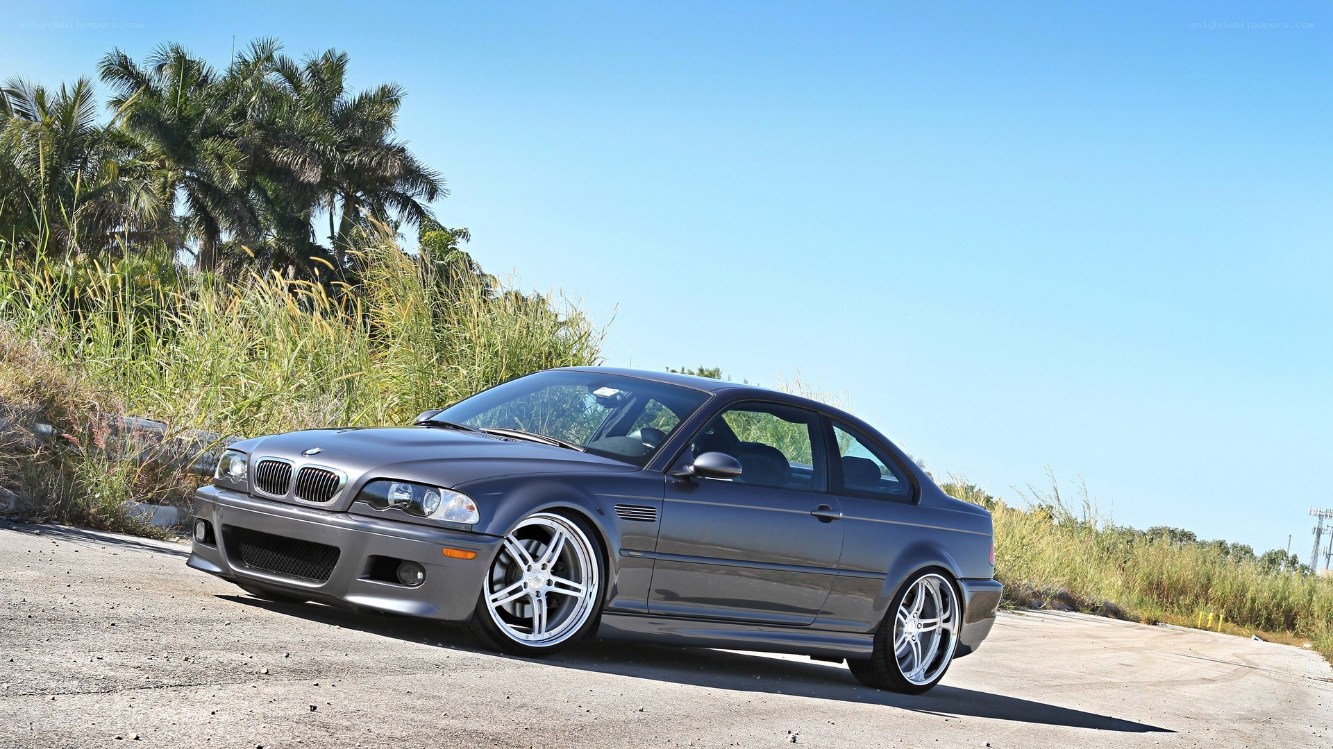 gray bmw m3 on a road