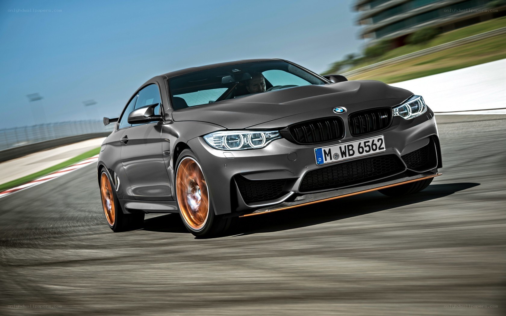 gray bmw m4 on racetrack
