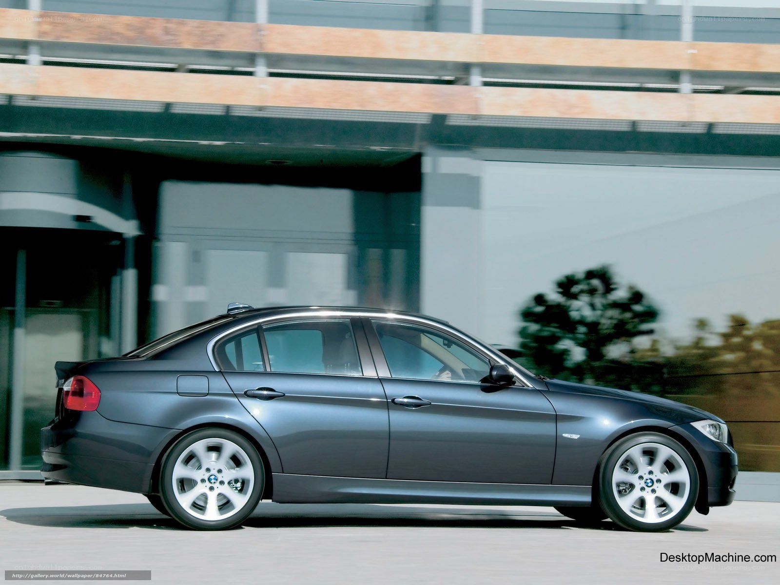 gray bmw sedan in motion