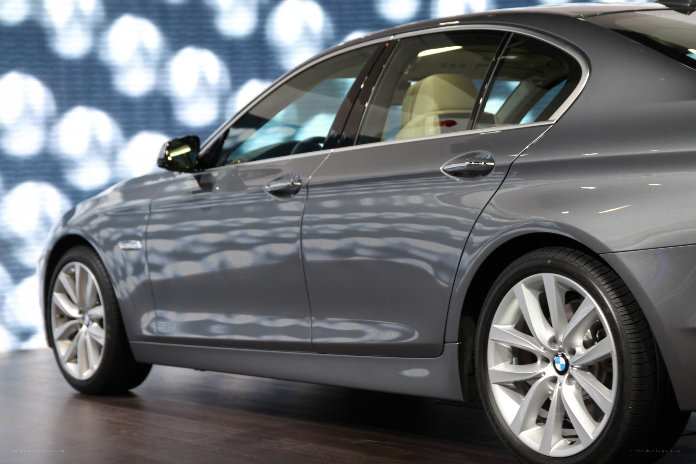 gray bmw sedan on display