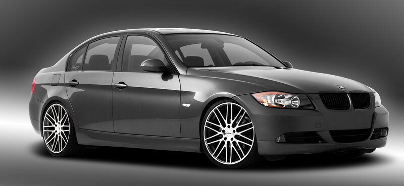 gray bmw sedan with custom wheels