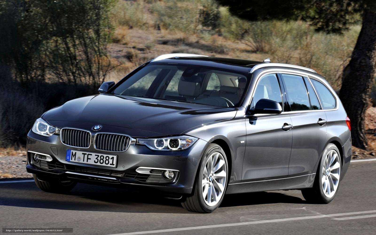 gray bmw station wagon on road