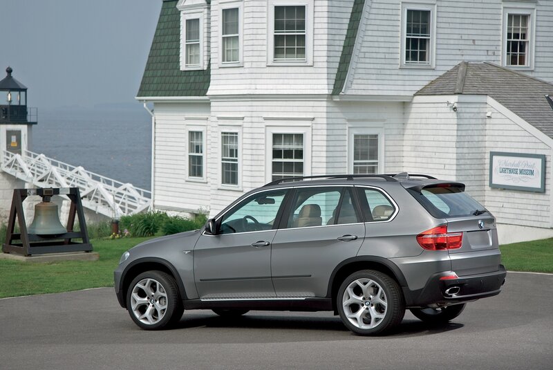 Gray BMW SUV at lighthouse