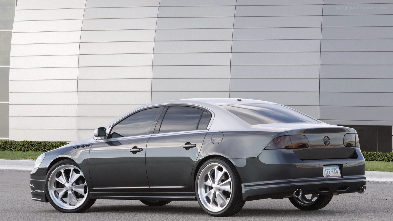 gray buick sedan parked