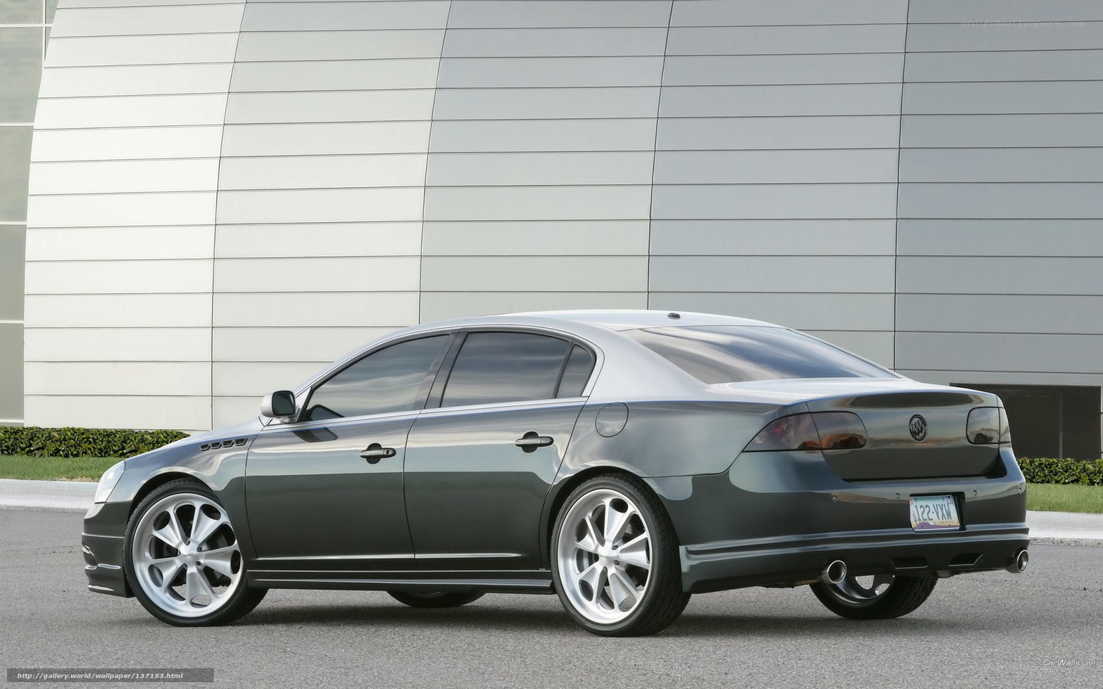 gray buick sedan parked