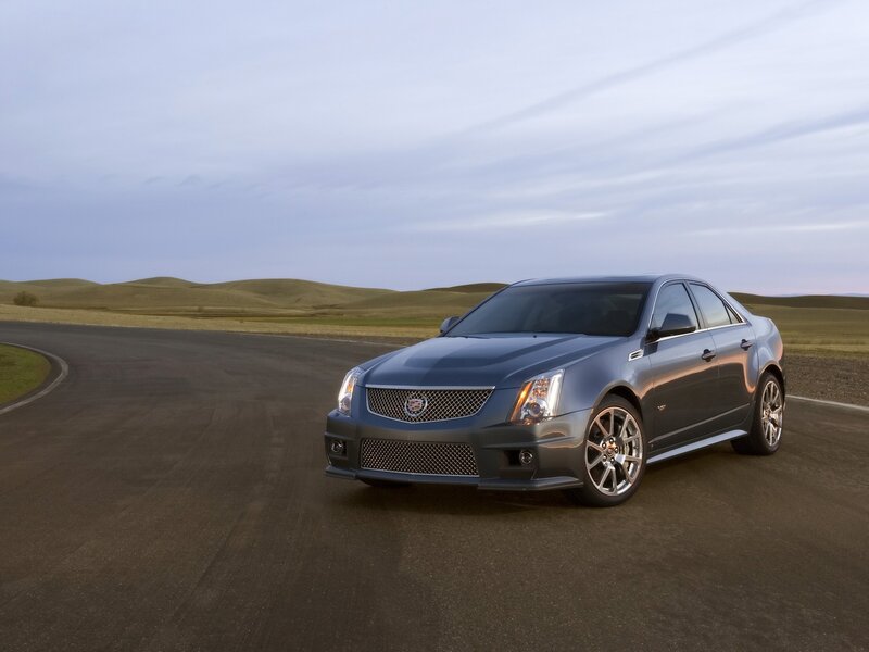Gray Cadillac Car — Serene