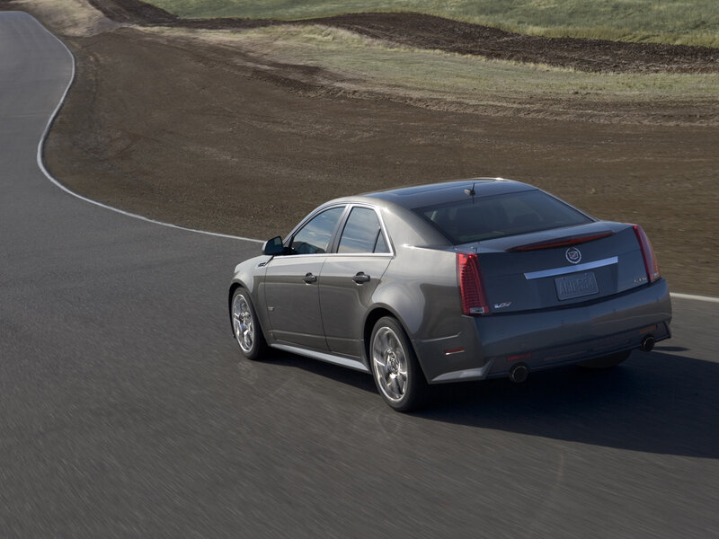 gray cadillac cts-v on a racetrack