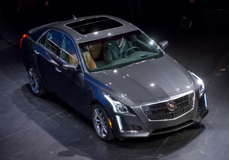 Gray Cadillac Sedan — Dramatic