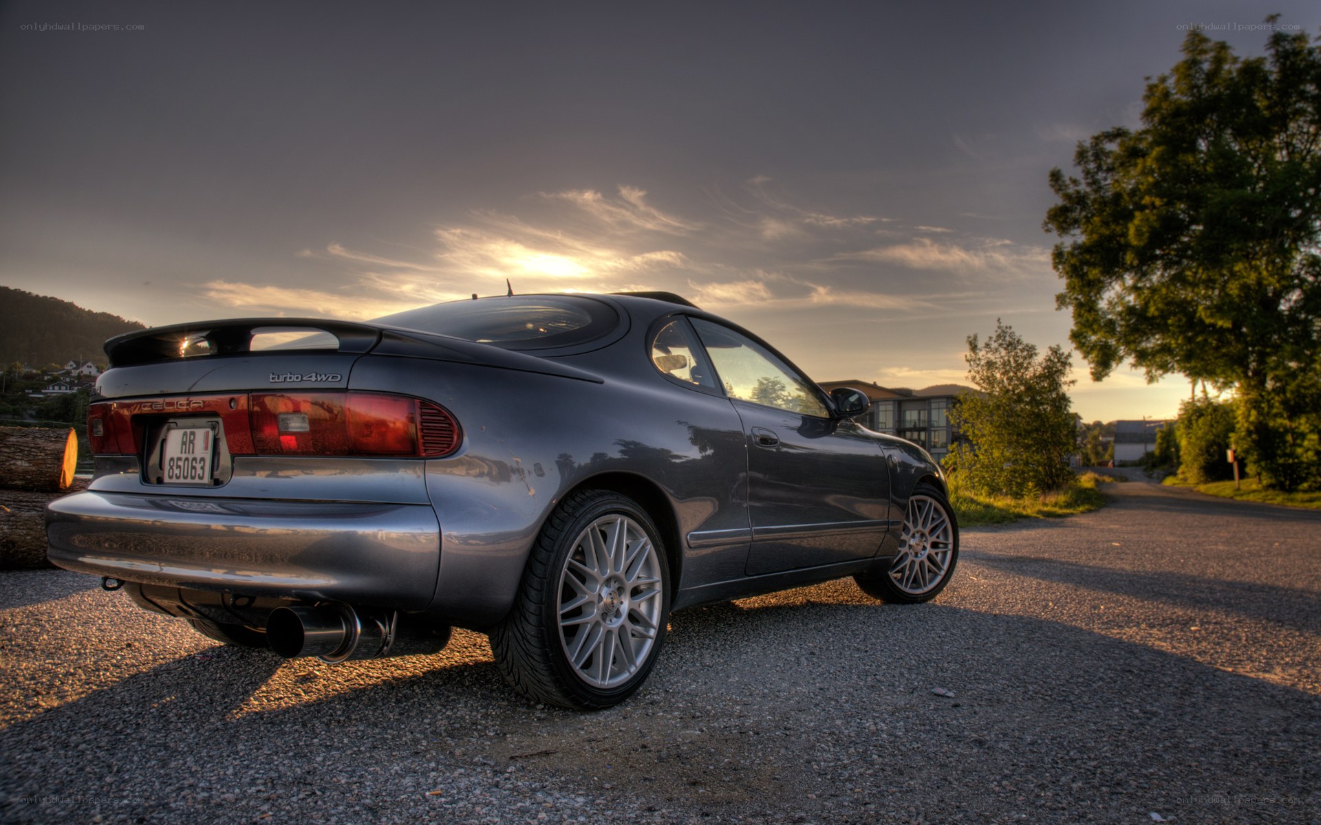 Gray car at sunset