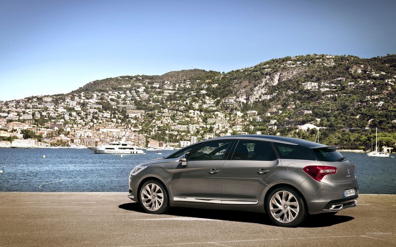 Gray car by the seaside