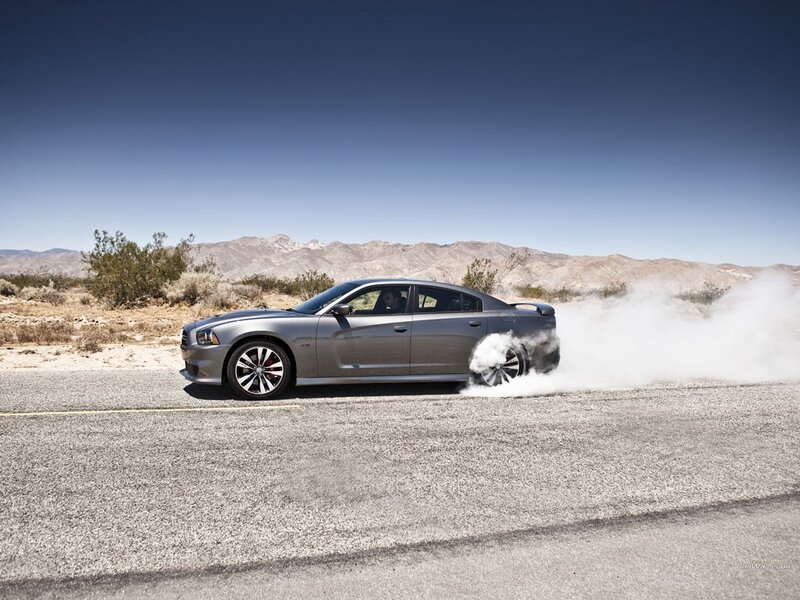 gray car doing burnout