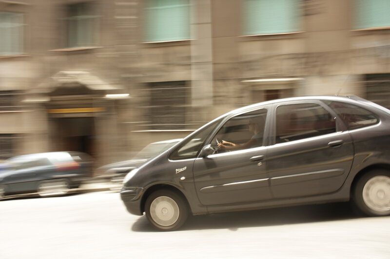 Gray Car in Motion