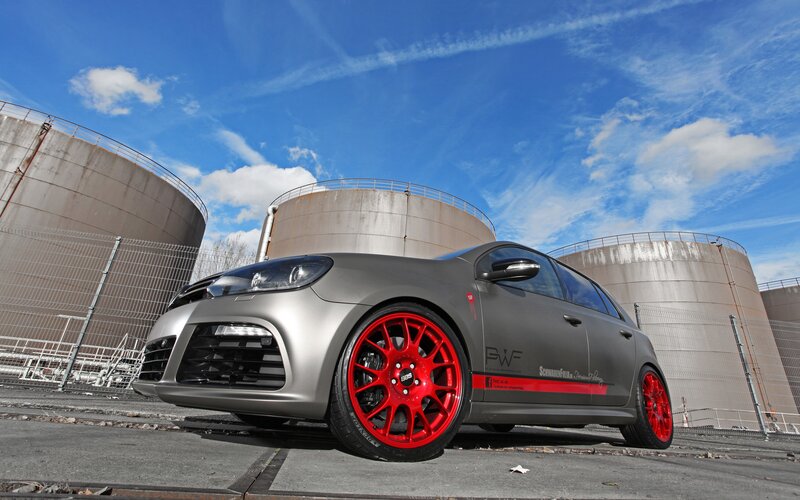 Gray Car with Red Wheels — Industrial