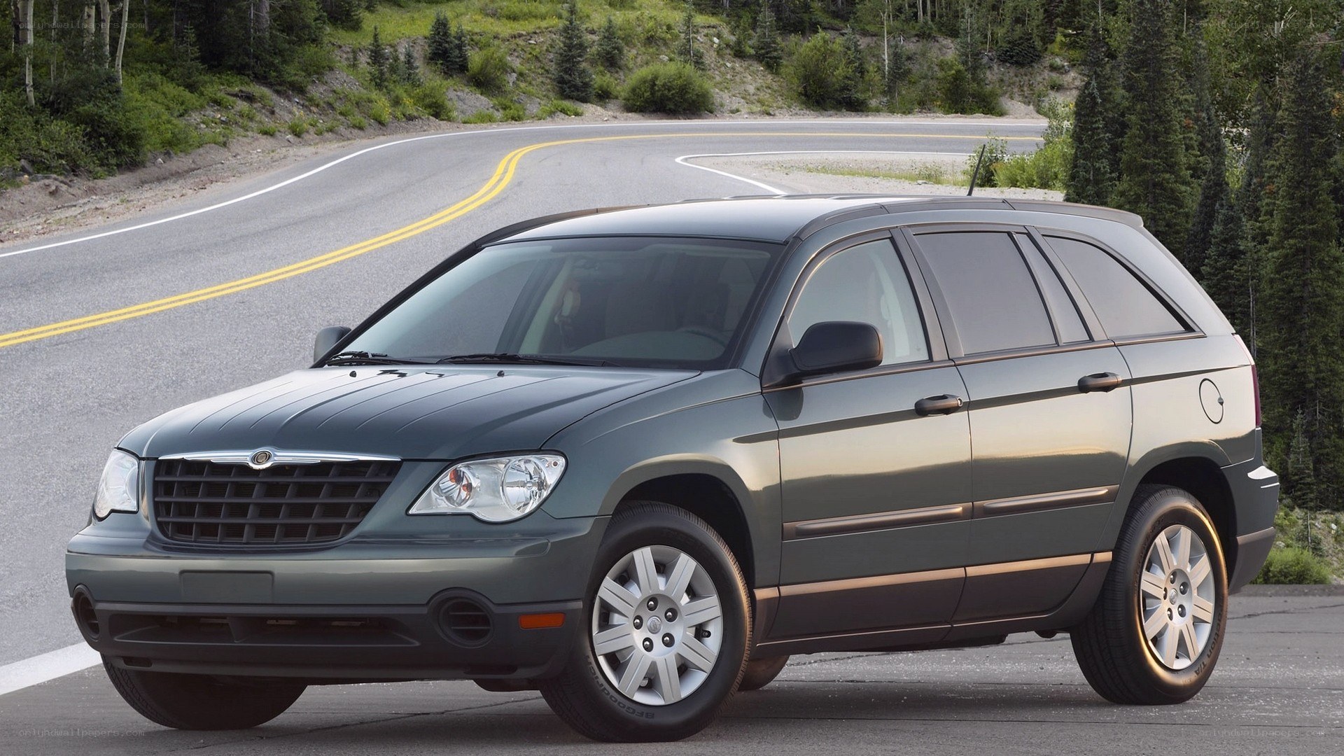 gray chrysler crossfire on winding road