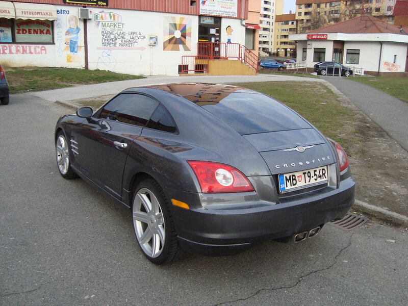 Gray Chrysler Crossfire parked on street