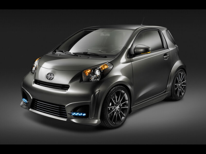 gray compact car with blue lights