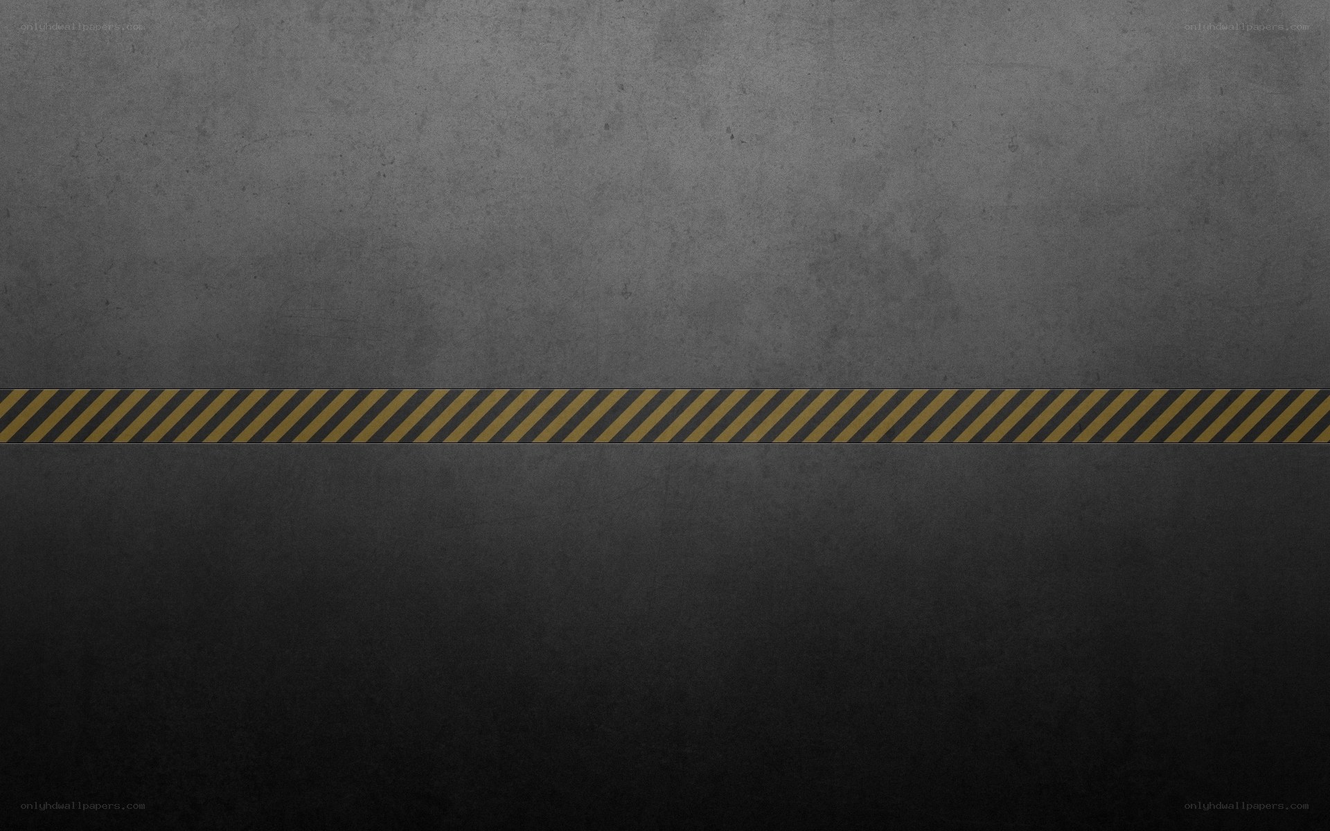 gray concrete with caution tape