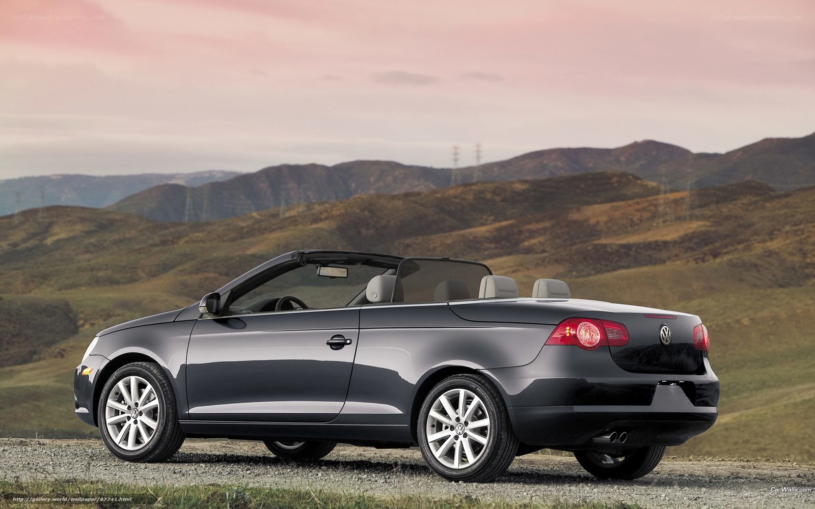 Gray convertible on a hillside