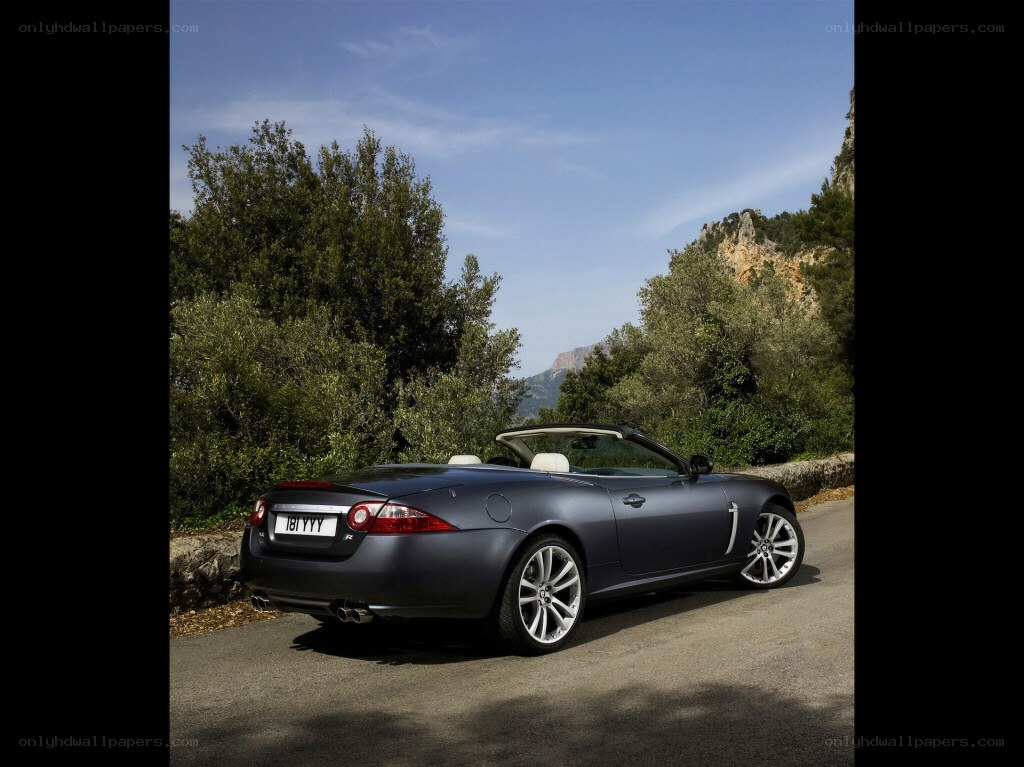Gray convertible on a mountain road