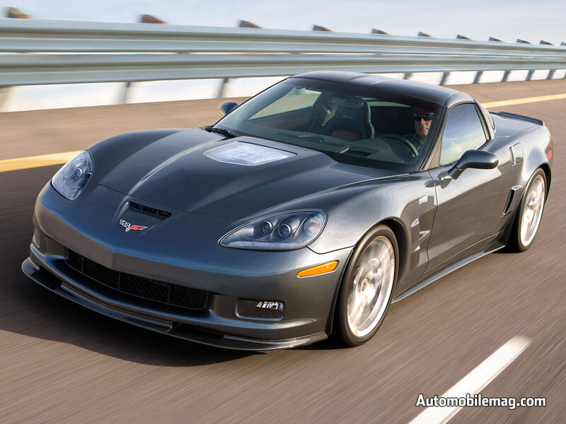 gray corvette driving on highway