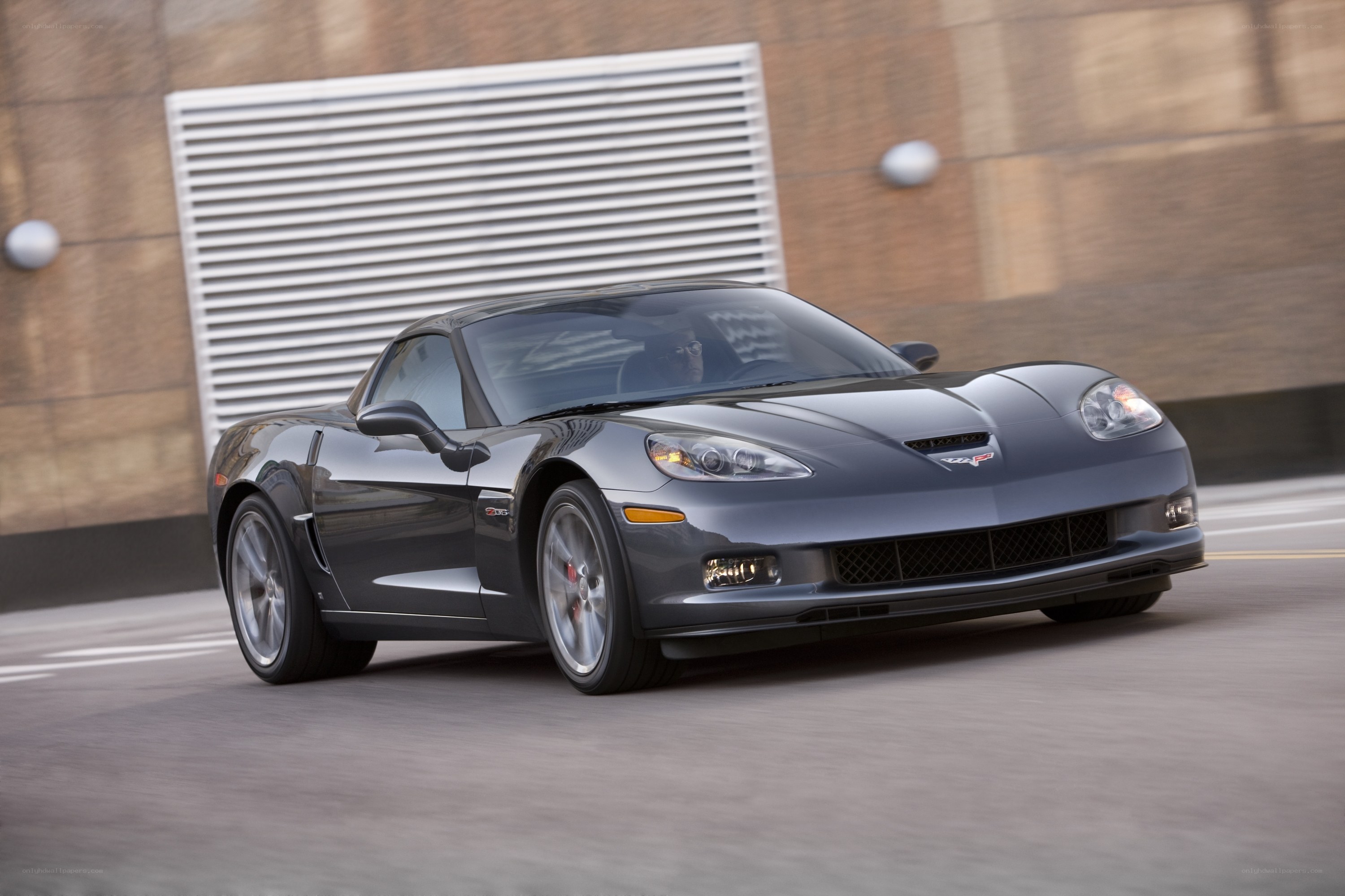 Gray Corvette sports car in motion
