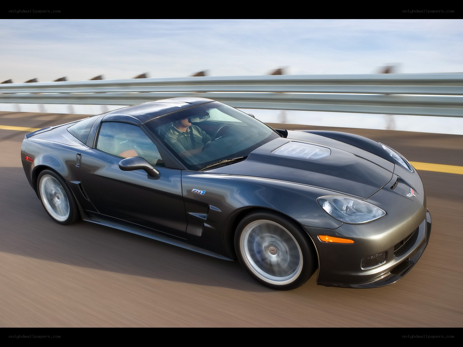 gray corvette zr1 on a bridge