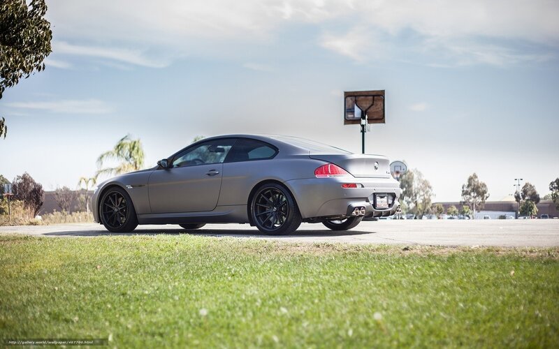 gray coupe on basketball court