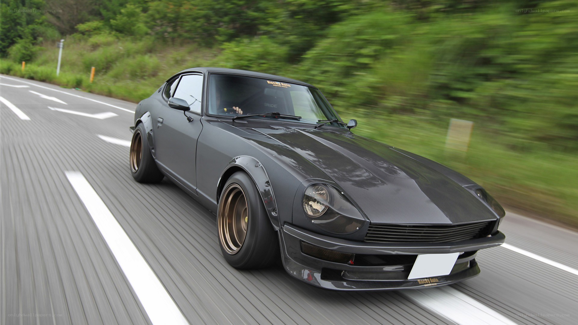 gray datsun 240z on a road