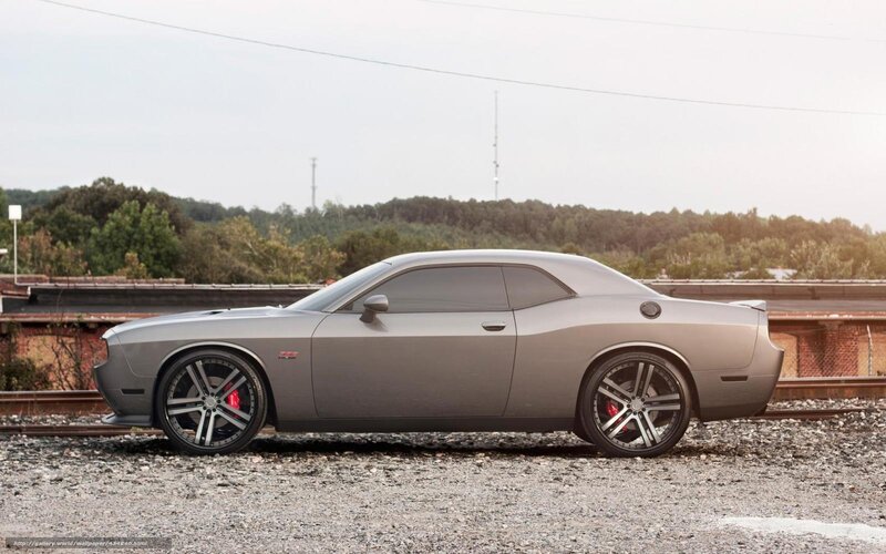 gray dodge challenger on tracks