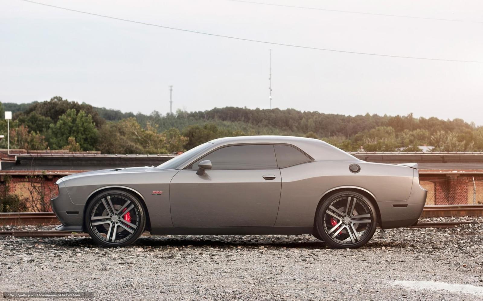 gray dodge challenger on tracks