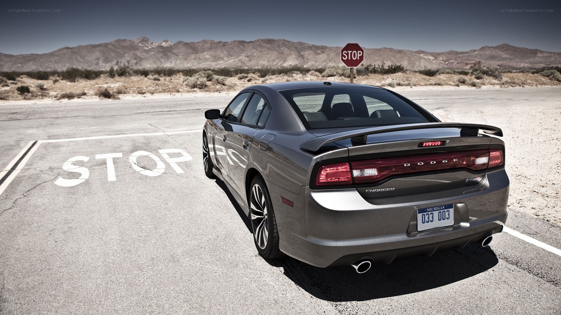 Gray Dodge Charger in desert