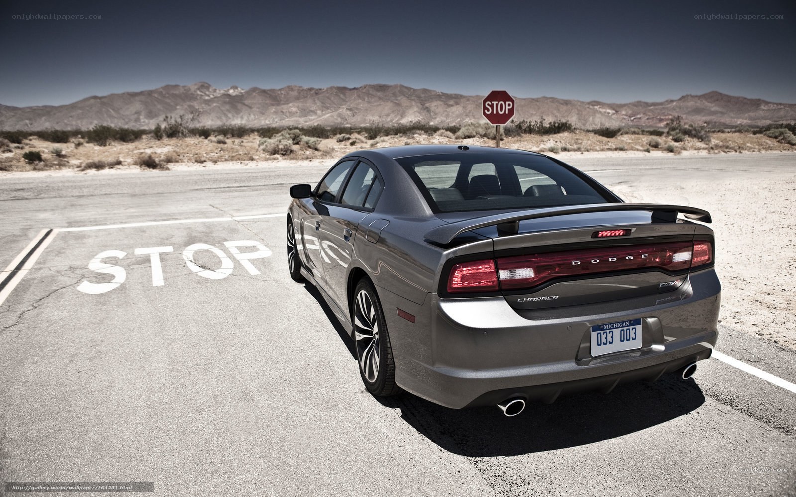 Gray Dodge Charger in desert