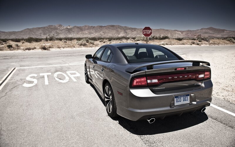 Gray Dodge Charger on desert road