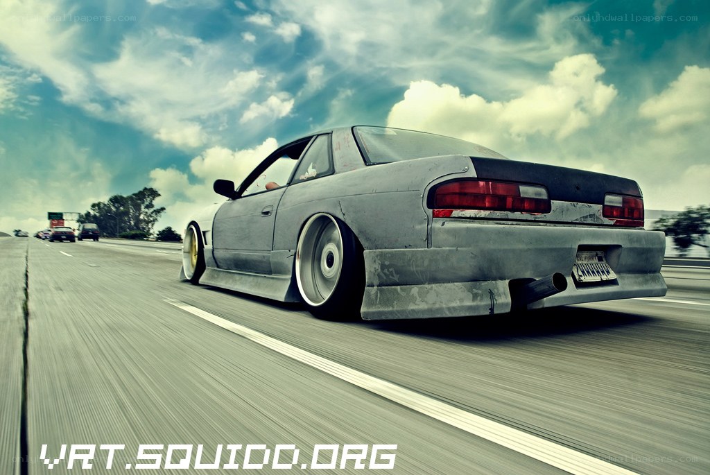 gray drift car on highway
