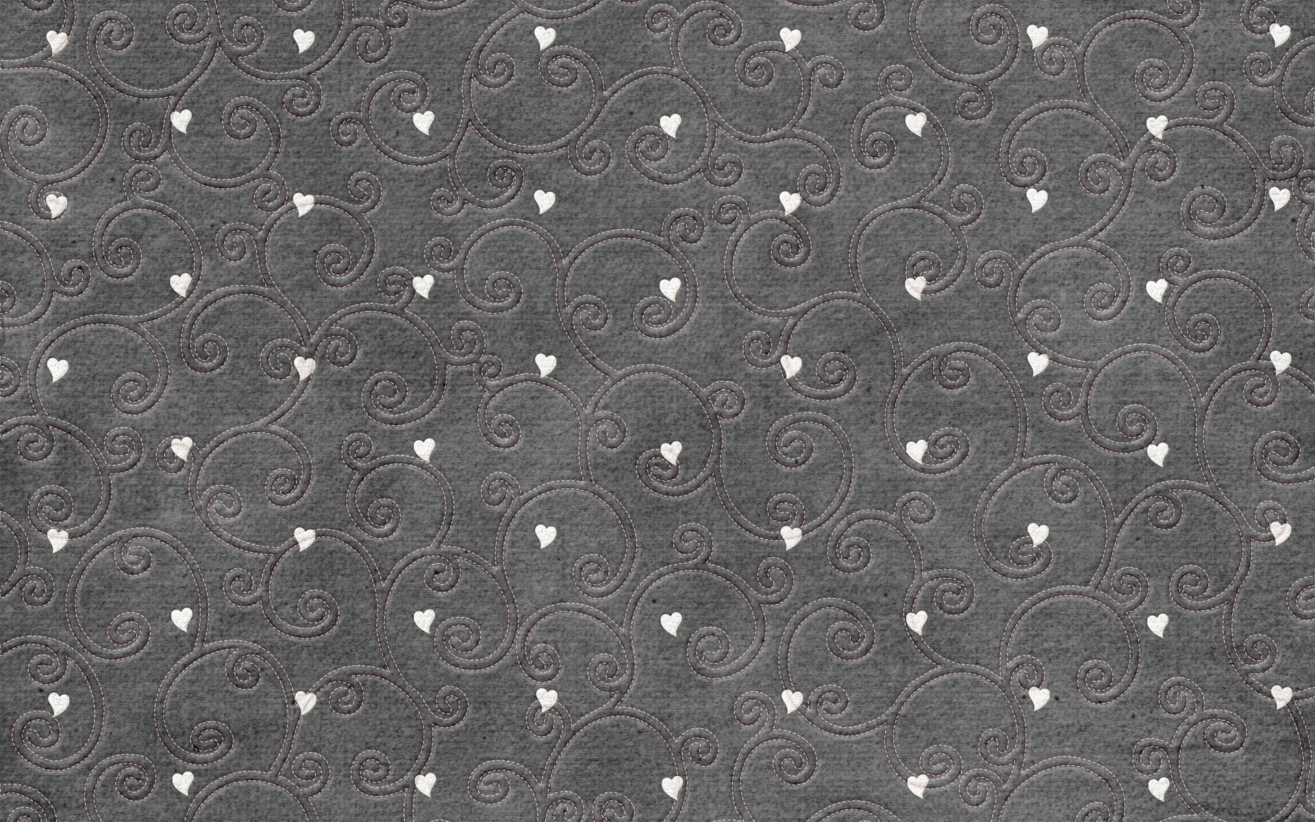 gray fabric with heart pattern