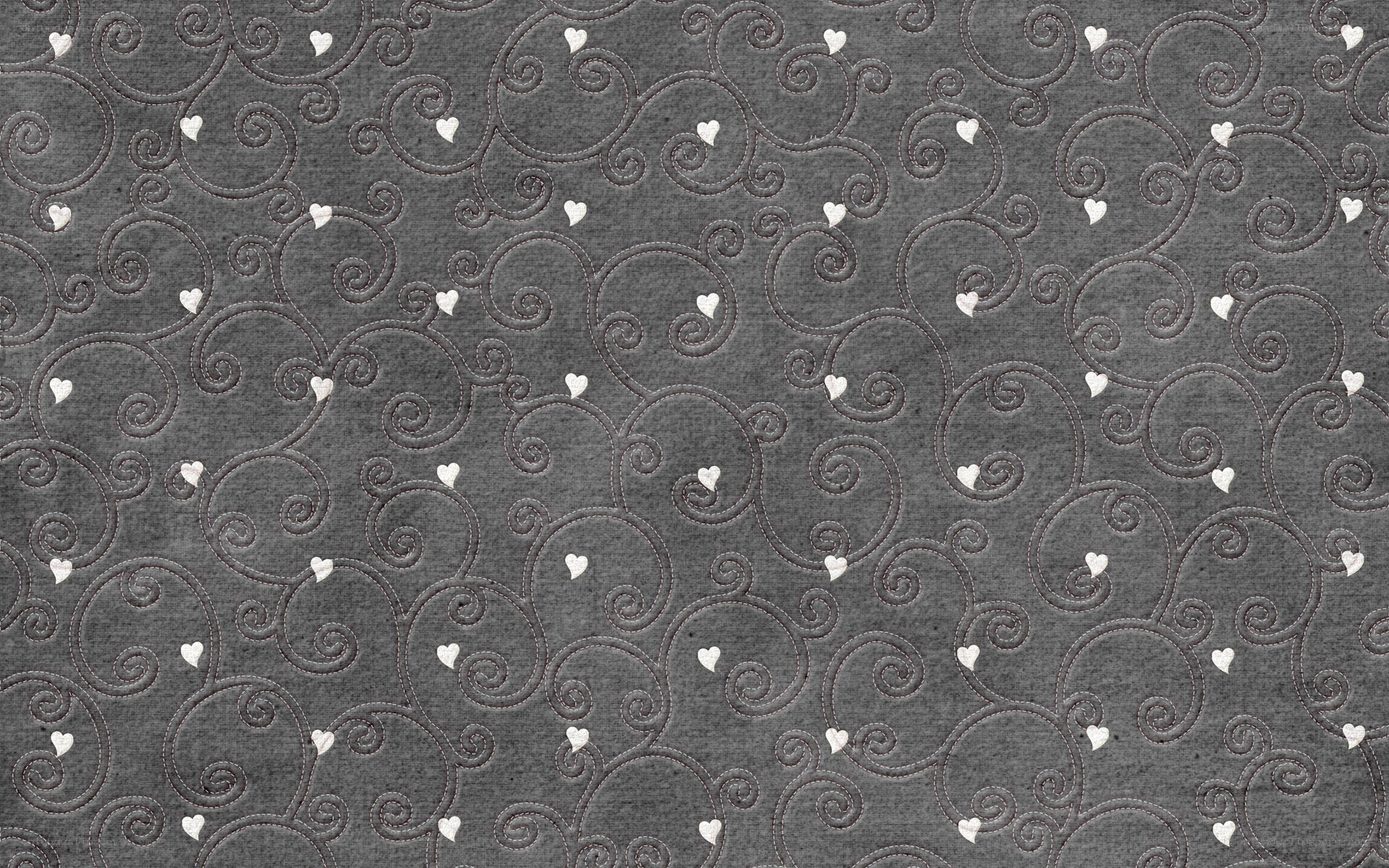 gray fabric with heart pattern