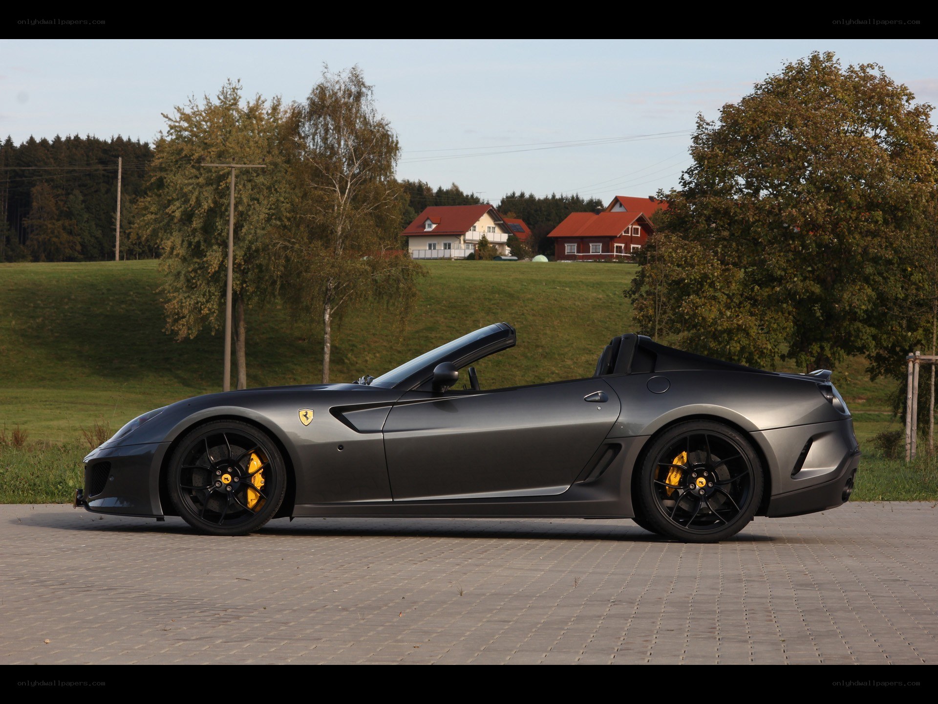 Gray Ferrari convertible on pavement