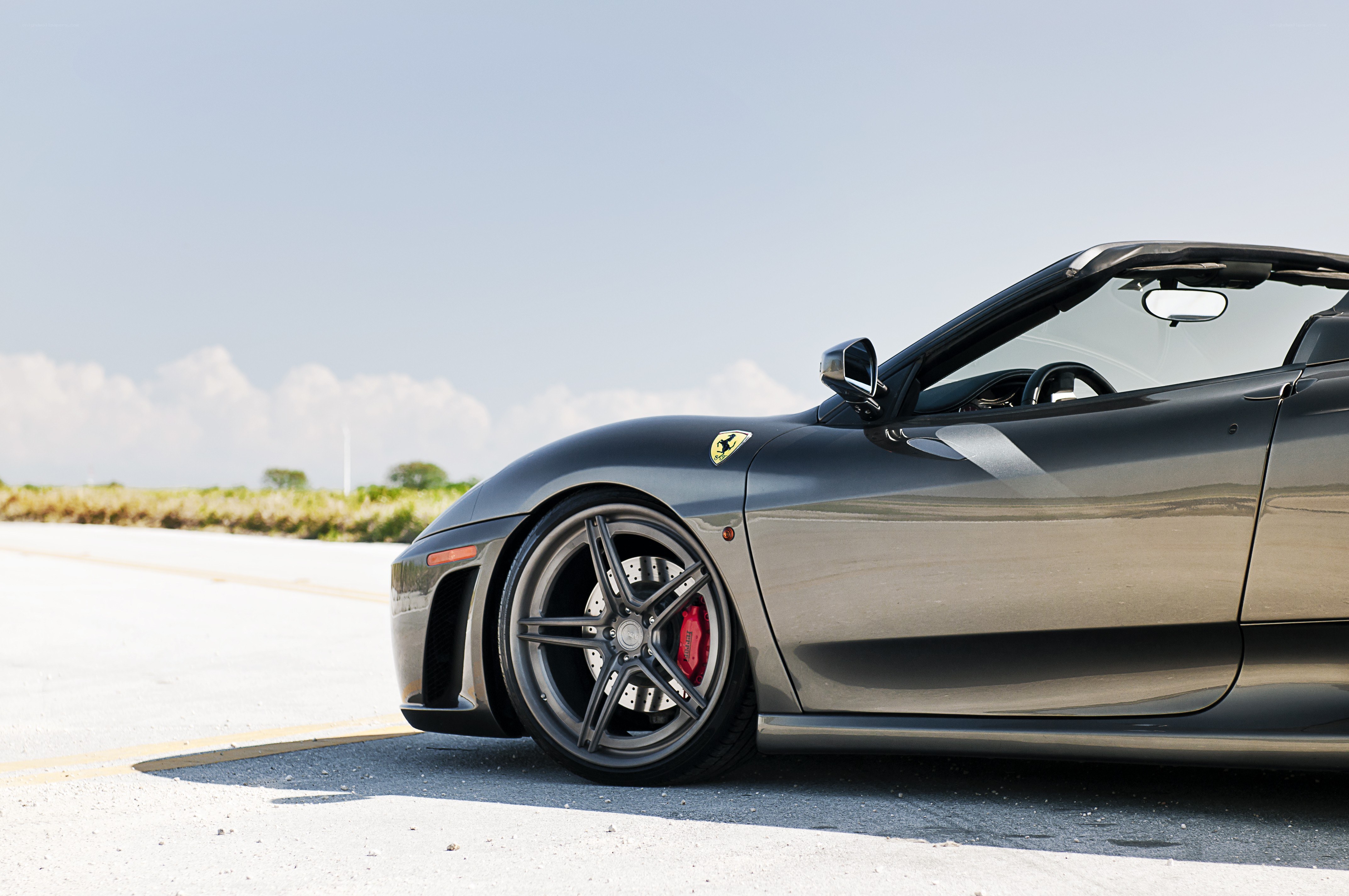 Gray Ferrari convertible on road