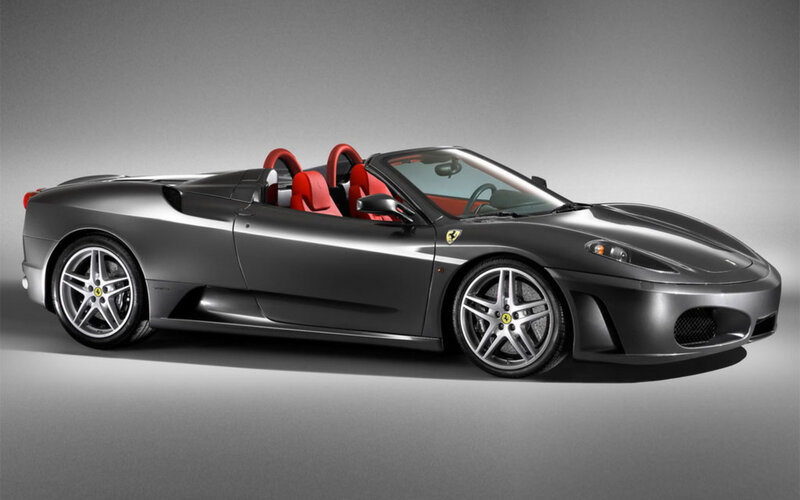 Gray Ferrari convertible sports car
