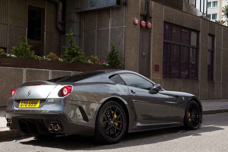 Gray Ferrari GTO parked on street