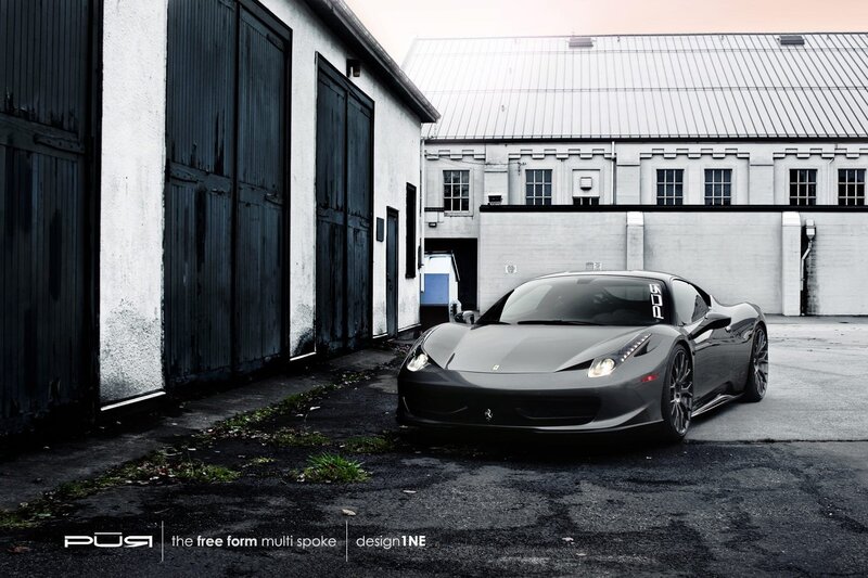 Gray Ferrari in an industrial lot
