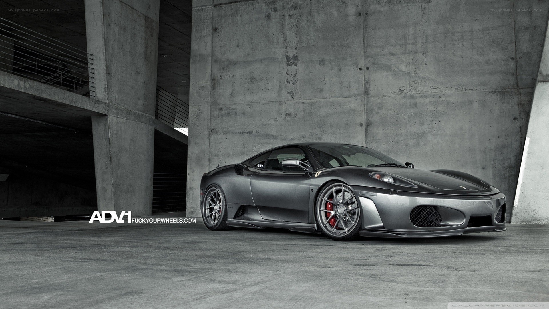 gray ferrari in concrete garage