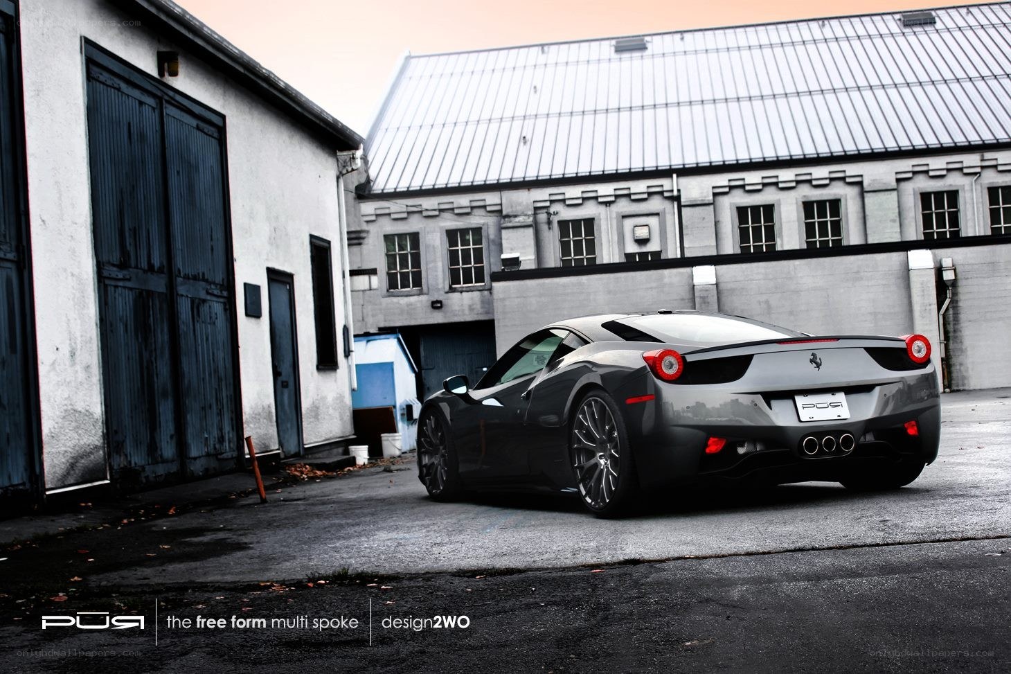 gray ferrari in industrial lot